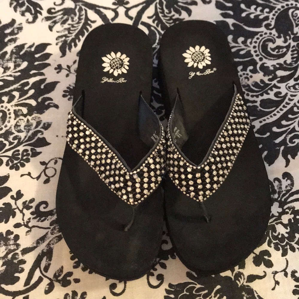 Black, rhinestone Yellow Box flip flops.
